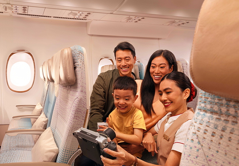 Complimentary polaroid pics Families fly better with Emirates